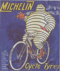 Michelin Man on Bike with Cigar